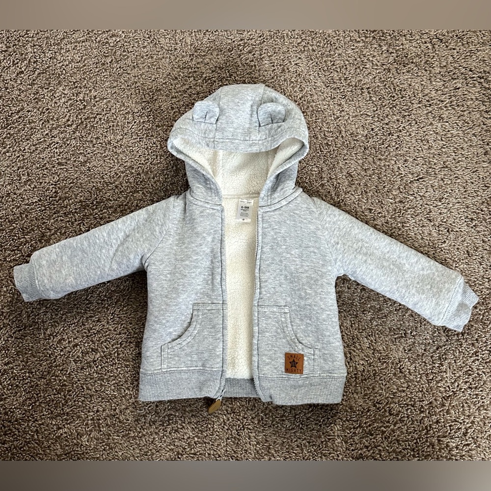 Carter’s grey, Sherpa lined hooded jacket. Size 6-9 months.